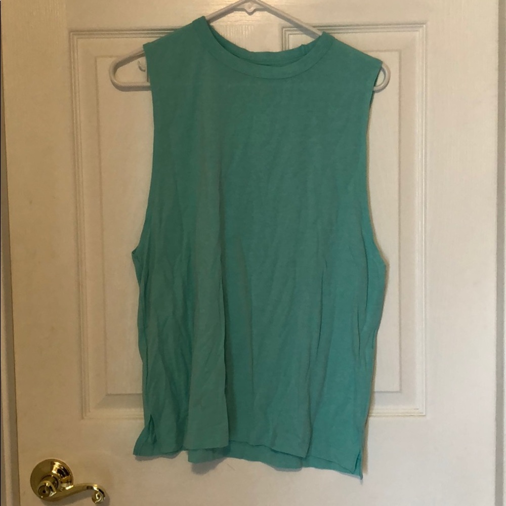 Sleeveless, mint green under armour tank, large
